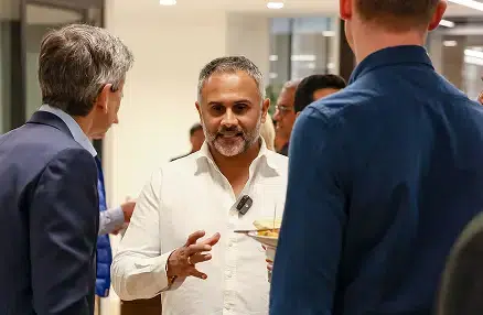 Aalok Shukla speaking with partners